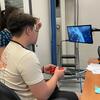 Students use game controllers